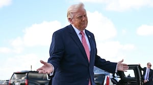 US President Donald Trump reacts to a question about Iran as he speaks to the press upon arrival at Miami International Airport in Miami, Florida, on March 27, 2026. Trump will deliver remarks at the FII PRIORITY Summit in Miami Beach. (Photo by Mandel NGAN / AFP via Getty Images)
