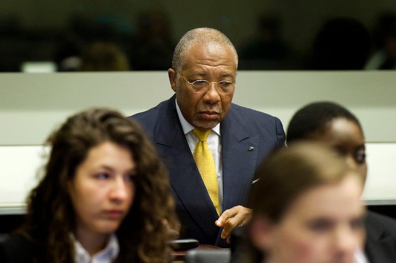 articles/2012/05/30/charles-taylor-s-hague-sentence-sparks-war-crimes-debate-in-liberia/charles-taylor-trial-macdougall_dqpv89