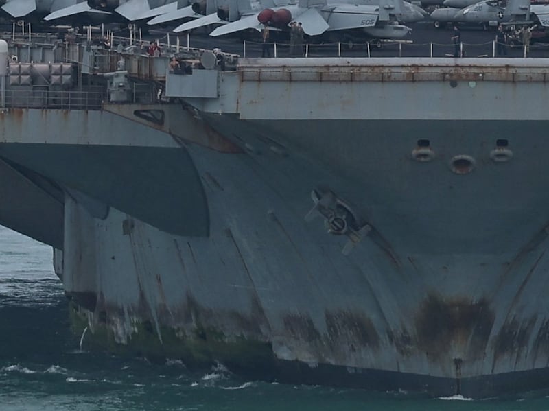 The U.S. Navy Nimitz-class aircraft carrier USS Abraham Lincoln sails toward Laem Chabang Port before docking for a rest stop following a long deployment in the Middle East, in Chonburi province, Thailand, September 2, 2026. REUTERS/Chalinee Thirasupa