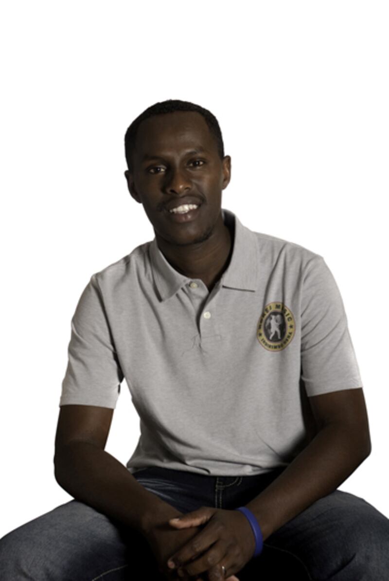 galleries/2012/03/05/congolese-refugee-portraits-photos/congolese-refugees-gray-polo_jgsjq5