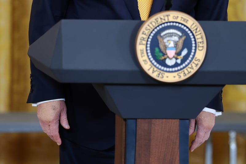 WASHINGTON, DC - MAY 06: U.S. President Donald Trump stands behind a podium as he speaks during a military mothers celebration in the East Room of the White House on May 6, 2026 in Washington, DC. President Trump and the first lady honored America's military mothers at the event ahead of Mother's Day.  (Photo by Anna Moneymaker/Getty Images)