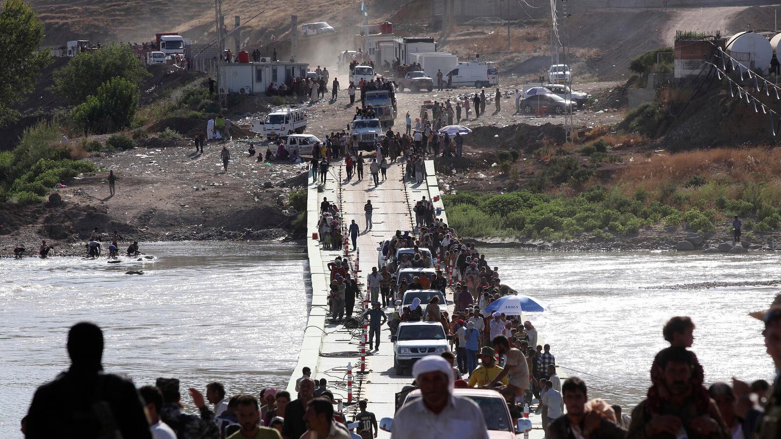 articles/2014/08/17/how-the-u-s-favored-kurds-abandoned-the-yazidis-when-isis-attacked/140816-sinjar-tease_ehzpu9