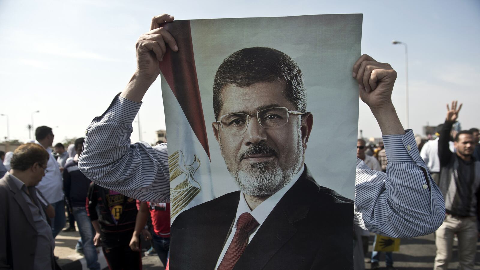 cheats/2013/11/04/morsi-i-m-the-legitimate-president/131104-morsi-trial-cheat_vbl68f