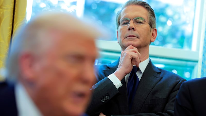 WASHINGTON, DC - APRIL 09: U.S. Treasury Secretary Scott Bessent looks on as U.S. President Donald Trump signs executive orders in the Oval Office of the White House on April 09, 2025 in Washington, DC. President Trump signed several executive orders including directing the “repeal of unlawful regulations” and reducing “anti-competitive regulatory barriers.” Earlier today, Trump announced a 90-day pause on the full effect of his new tariffs for dozens of countries with the exception of China. (Photo by Anna Moneymaker/Getty Images)