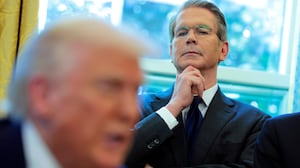 WASHINGTON, DC - APRIL 09: U.S. Treasury Secretary Scott Bessent looks on as U.S. President Donald Trump signs executive orders in the Oval Office of the White House on April 09, 2025 in Washington, DC. President Trump signed several executive orders including directing the “repeal of unlawful regulations” and reducing “anti-competitive regulatory barriers.” Earlier today, Trump announced a 90-day pause on the full effect of his new tariffs for dozens of countries with the exception of China. (Photo by Anna Moneymaker/Getty Images)
