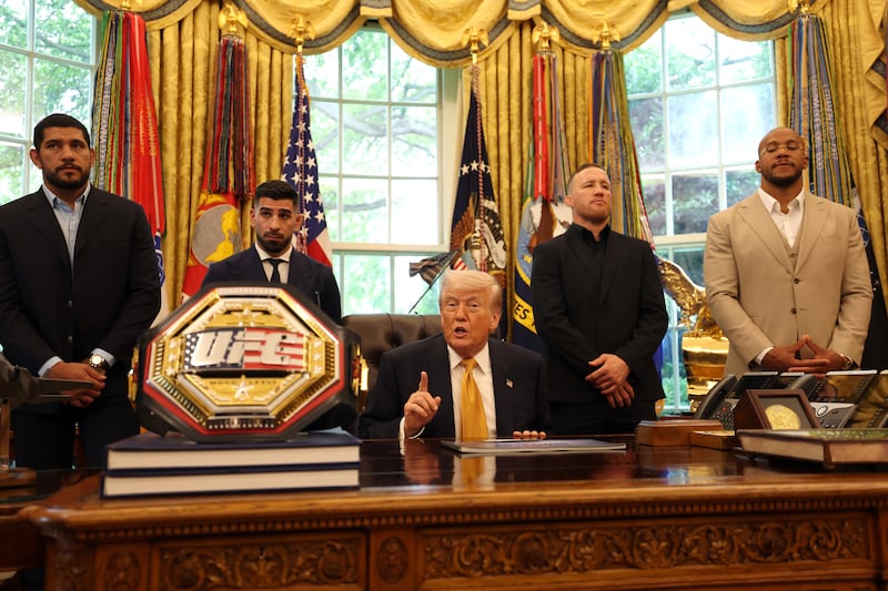 President Donald Trump speaks to reporters in the Oval Office alongside UFC Freedom 250 fighters Ilia Topuria, Alex Pereira, Justin Gaethje, and Ciryl Gane.