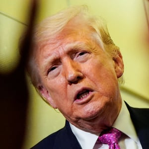U.S. President Donald Trump talks to members of the media aboard Air Force One en route to Joint Base Andrews, Maryland, U.S., March 29, 2026. REUTERS/Elizabeth Frantz