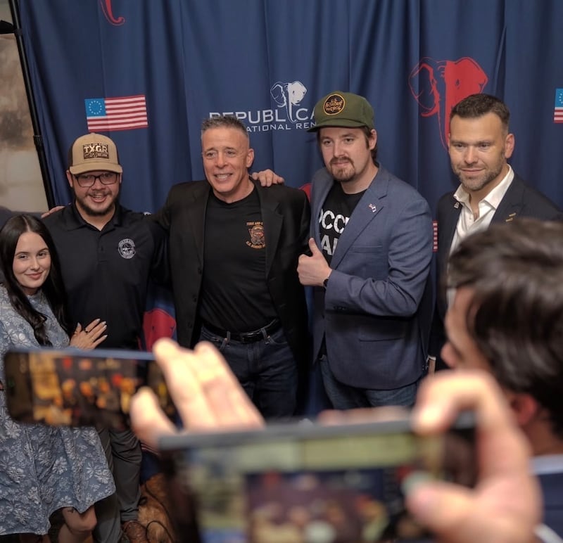 Former Border Force commander Greg Bovino surrounded by fans, including Kyle Rittenhouse (left) and Jack Posobiec (far right).