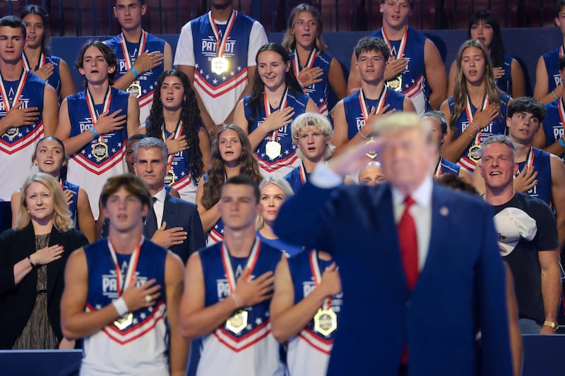 U.S. President Donald Trump salutes during the 2026 Patriot Games final at SPIRE Academy in Geneva, Ohio, U.S., August 11, 2026. REUTERS/Kylie Cooper