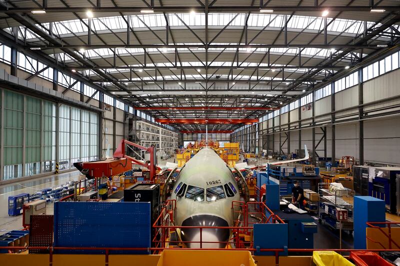 HAMBURG, GERMANY - JANUARY 18: Various new versions of the A320 passenger aircraft family are pictured at the A320 passenger plane assembly line at the Airbus factory are pictured during a visit of Federal Economy and Climate Protection Minister, Robert Habeck on January 18, 2022 in Hamburg, Germany. Habeck, co-leader of the German Greens party, is seeking to accelerate Germany's push towards its climate protection goals without decreasing the competitiveness of Germany's manufacturing sector. (Photo by Morris MacMatzen/Getty Images)