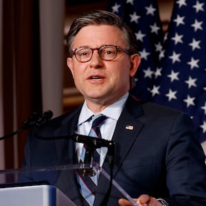 House Speaker Mike Johnson was questioned about Trump voting by mail despite attacking vote-by-mail.