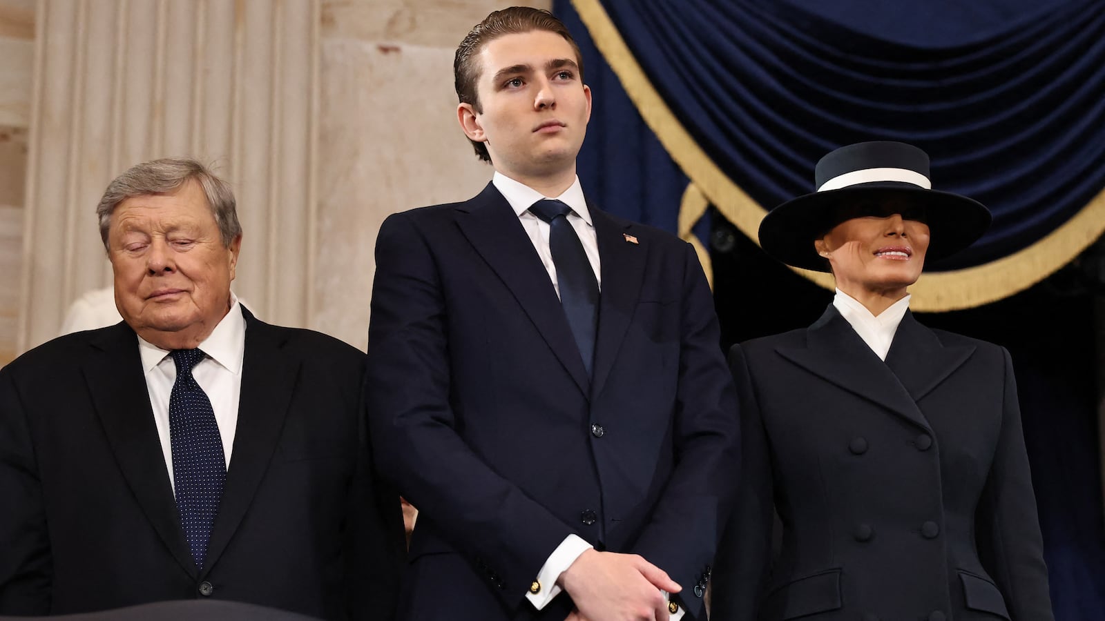 Viktor Knavs, Barron Trump and Melania Trump attend the inauguration of US President-elect Donald Trump in the Rotunda of the US Capitol on January 20, 2025 in Washington, DC.