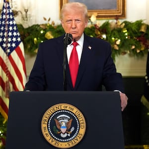 TOPSHOT - US President Donald Trump addresses the nation from the Diplomatic Reception Room of the White House in Washington, DC, on December 17, 2025. (Photo by Doug MILLS / POOL / AFP via Getty Images)
