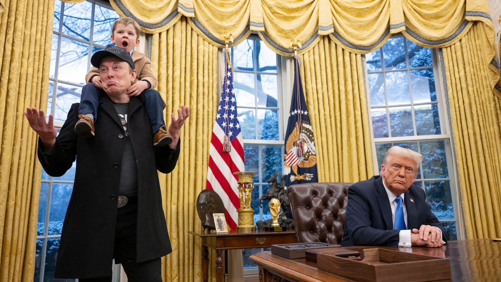 TOPSHOT - Tesla and SpaceX CEO Elon Musk with his son X Æ A-Xii join US President Donald Trump as he signs executive orders in the Oval Office of the White House in Washington, DC, February 11, 2025. Tech billionaire Elon Musk, who has been tapped by President Donald Trump to lead federal cost-cutting efforts, said the United States would go "bankrupt" without budget cuts. Musk leads the efforts under the newly created Department of Government Efficiency (DOGE), and was speaking at the White House with Trump, who has in recent weeks unleashed a flurry of orders aimed at slashing federal spending.