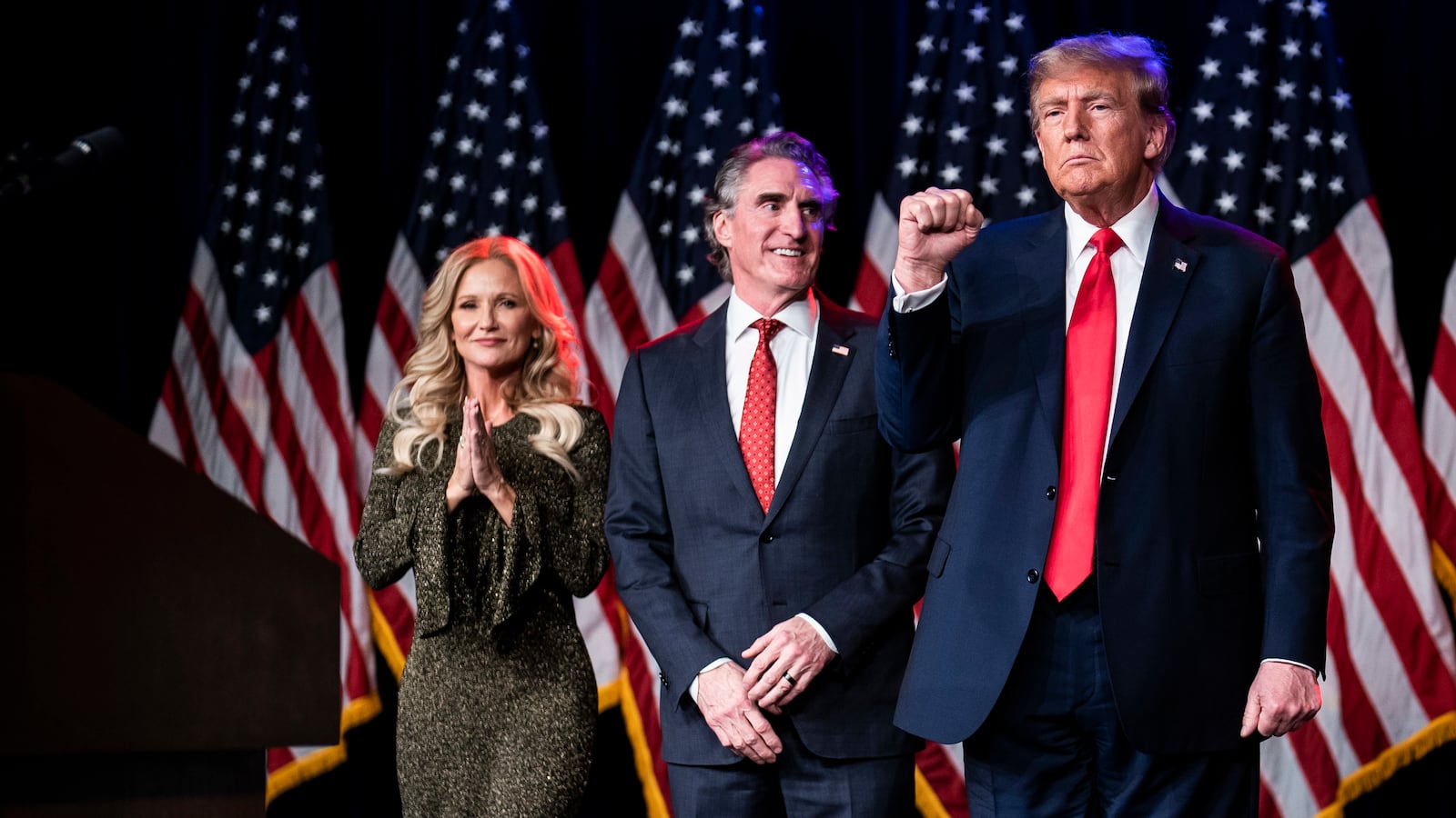 Donald Trump, flanked by North Dakota Gov. Doug Burgum and his wife, Kathryn, in Las Vegas on Feb 8, 2024.