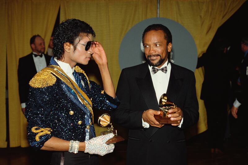 Michael Jackson and Quincy Jones attend the 26th Grammy Awards ceremony in 1984 where they won eight awards.