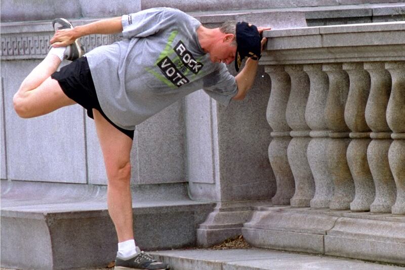 galleries/2012/04/10/obama-s-push-ups-from-sarkozy-biking-to-cameron-running-more-world-leaders-working-out-photos/world-leader-workouts-clinton_wdiwp8