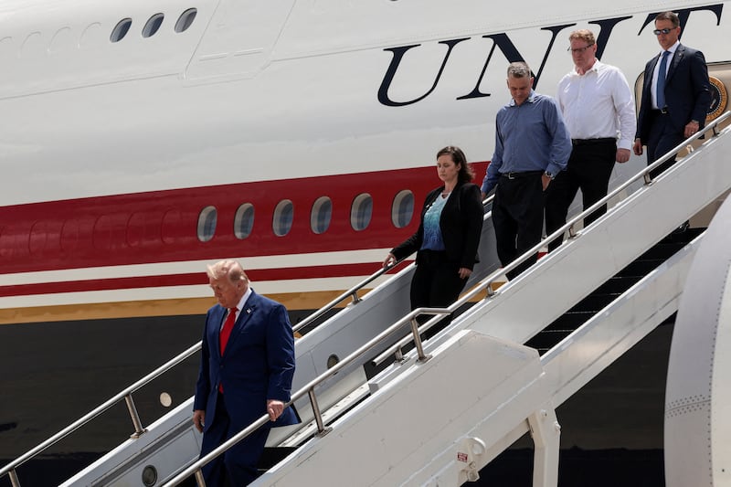 Trump arrives at Georgia's Dobbins Air Reserve Base with the family members of U.S. Army 1st Lt. Tyler James Feehan of the 2nd Battalion, 55th Air Defense Artillery Regiment, 32nd Army Air Missile Defense Command, who was killed during an attack at Muwaffaq Salti Air Base in Jordan.