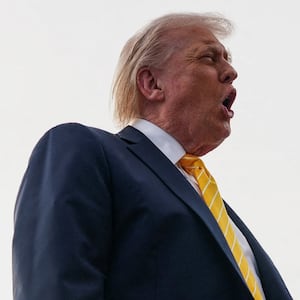 U.S. President Donald Trump speaks to the media before boarding Air Force One for departure to Miami, Florida, at Palm Beach International Airport in West Palm Beach, Florida, U.S., May 2, 2026. REUTERS/Nathan Howard