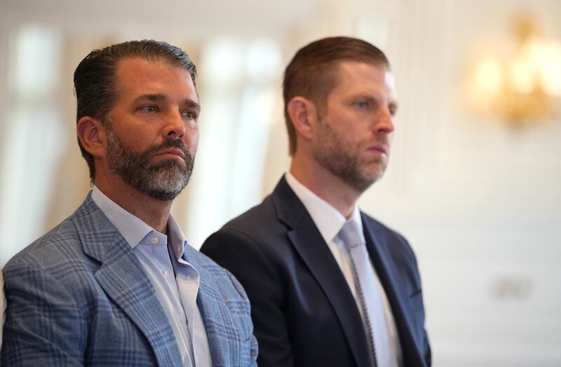 Donald Trump Jr. and Eric Trump U.S. look on