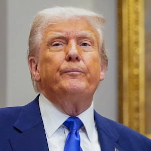 U.S. President Donald Trump holds an executive order on prescription drug pricing next to U.S. Health and Human Services (HHS) Secretary Robert F. Kennedy, Jr., during a press conference in the Roosevelt Room at the White House in Washington, D.C., U.S., May 12, 2025.