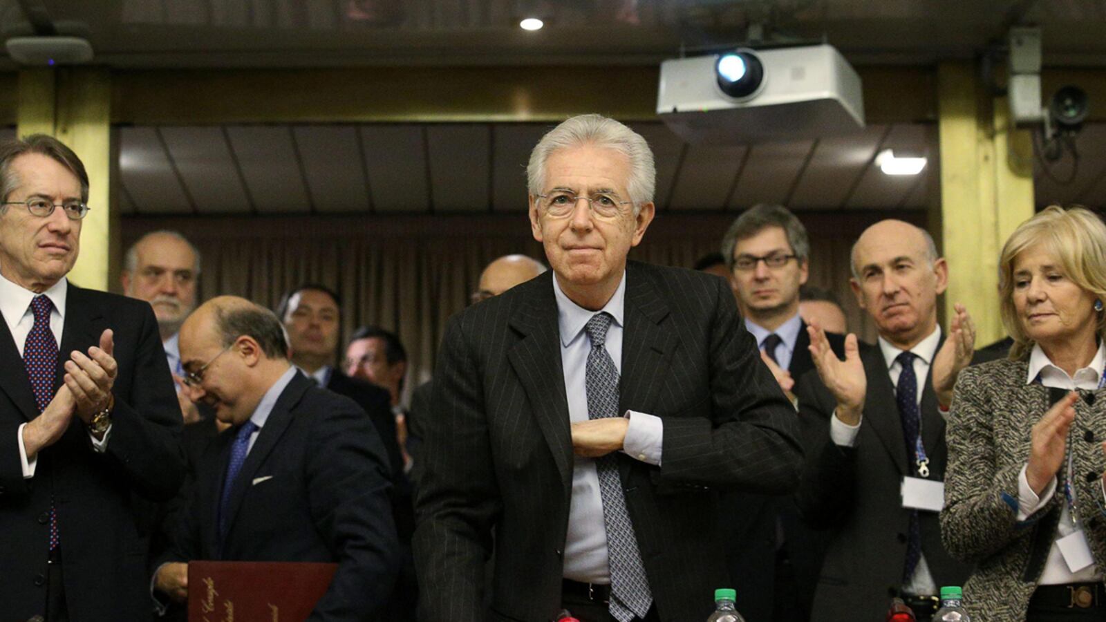 articles/2012/12/22/prime-minister-monti-resigns-will-silvio-berlusconi-rise-again/nadeau-monti-resigns-tease-embed_woqyva