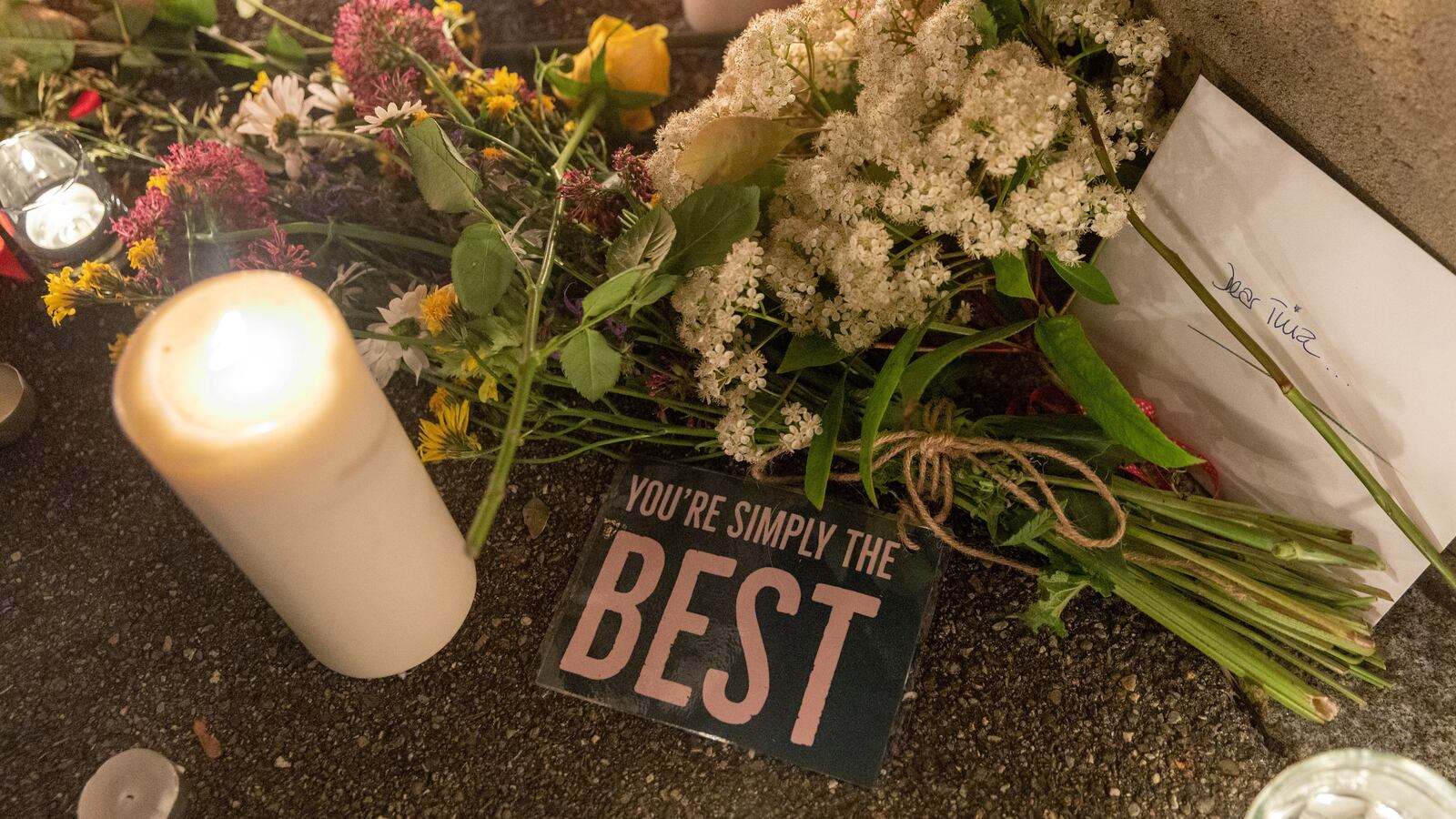 Flowers and candles are pictured in front of the home of Tina Turner in Kuesnacht near Zurich, Switzerland, May 25, 2023.
