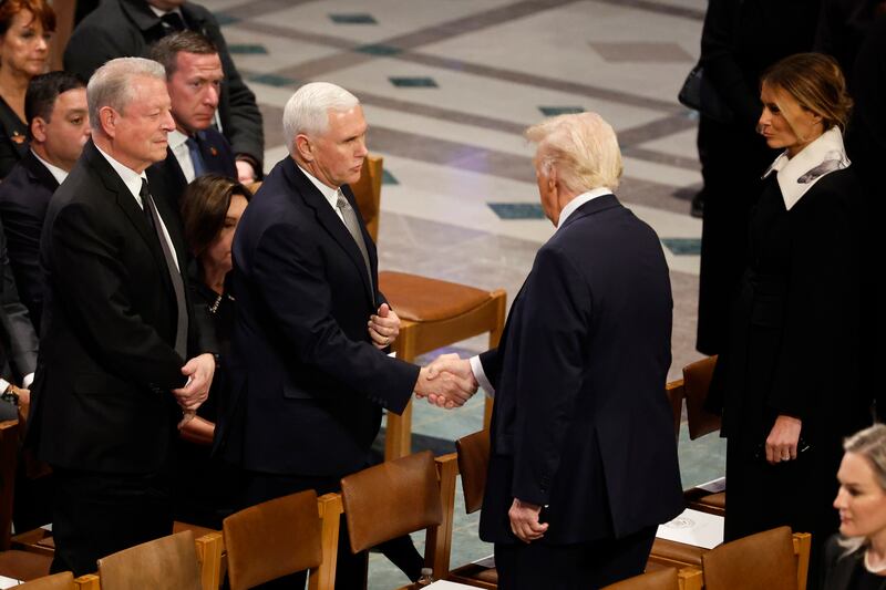 WASHINGTON, DC - JANUARY 09: U.S. President-elect Donald Trump greets former U.S. Vice President Mike Pence as he arrives with Melania Trump as former U.S. Vice President Al Gore looks on during the state funeral for former U.S. President Jimmy Carter at Washington National Cathedral on January 09, 2025 in Washington, DC. President Joe Biden declared today a national day of mourning for Carter, the 39th President of the United States, who died at the age of 100 on December 29, 2024 at his home in Plains, Georgia. (Photo by Chip Somodevilla/Getty Images)