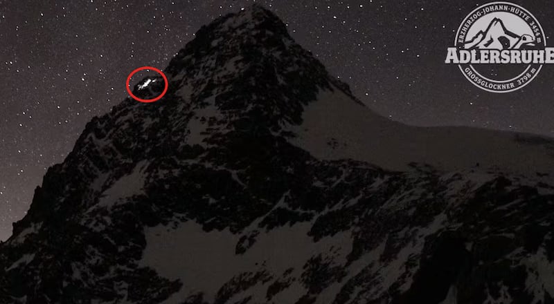 Webcam footage shows the couple's lights start to dim as they become stranded atop the mountain.