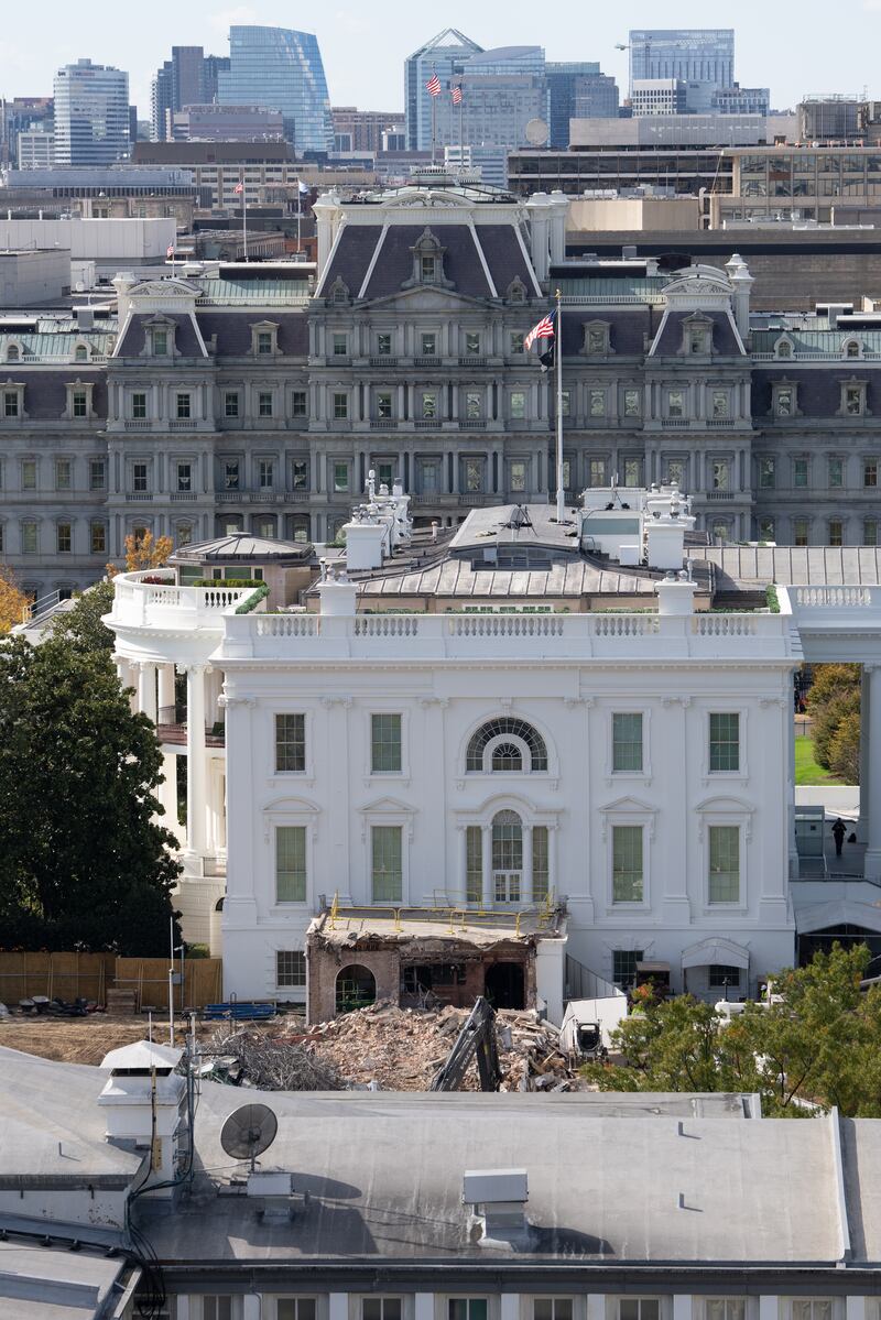 WASHINGTON, DC - OCTOBER 23: An excavator works to clear rubble after the East Wing of the White House was demolished on October 23, 2025 in Washington, DC. The demolition is part of U.S. President Donald Trump's plan to build a ballroom reportedly costing at least $250 million on the eastern side of the White House. (Photo by Eric Lee/Getty Images)