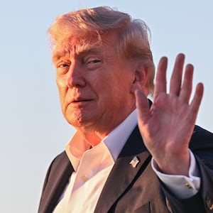 President Donald Trump disembarks from Air Force One upon arrival from Miami on May 3, 2026 at Joint Base Andrews, Florida. Trump spent the weekend at his Mar-a-Lago resort in Doral, Florida.