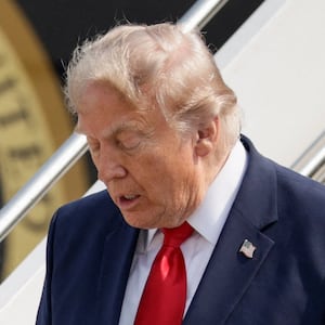 U.S. President Donald Trump disembarks the new Air Force One, a plane gifted by the Qatari government, as he arrives at Bismarck Municipal Airport in Bismarck, North Dakota, U.S., July 1, 2026.