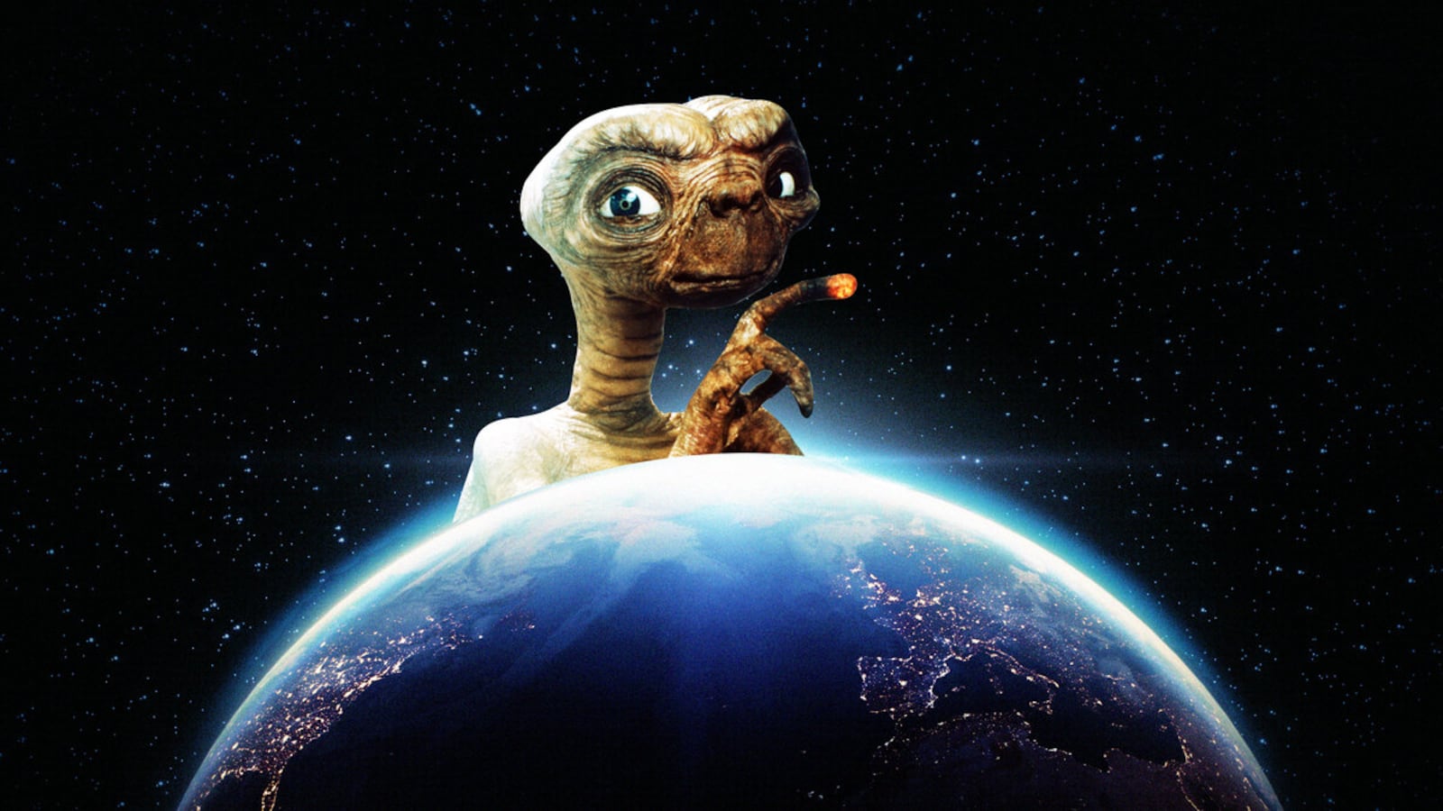 An illustration including photos of Planet Earth, E.T and Stars