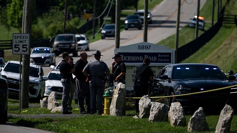 LEXINGTON, KENTUCKY - JULY 13: Police assess the scene after a shooting at Richmond Road Baptist Church on July 13, 2025 in Lexington, Kentucky. Two people were killed and two others injured at the church after the shooter shot and injured a state trooper at the Blue Grass Airport before fleeing and eventually stopping at the Richmond Road Baptist Church. (Photo by Michael Swensen/Getty Images)