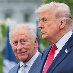 Britain's King Charles looks at U.S. President Donald Trump during an arrival ceremony, in Washington, D.C., U.S., April 28, 2026.