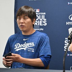 Los Angeles Dodgers' Shohei Ohtani (R) and his interpreter Ippei Mizuhara (L) attending a press conference at Gocheok Sky Dome in Seoul, on March 16 2024.