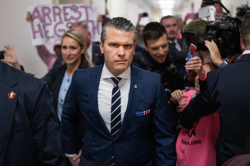 Defense Secretary Pete Hegseth and his wife, Jennifer, arrive on Capitol Hill to testify before the House Armed Services Committee on Wednesday, April 29, 2026.