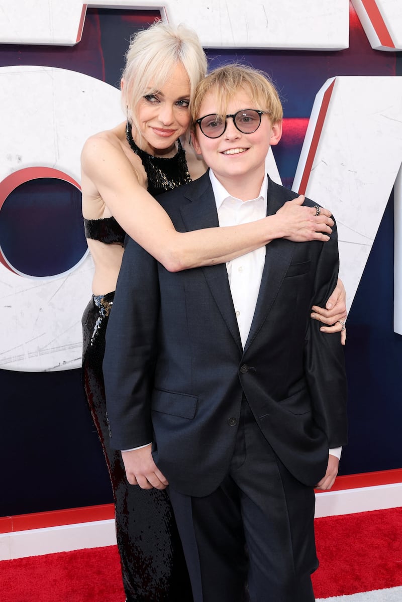 Cast member Anna Faris and her son Jack Pratt attend the world premiere for the film "Scary Movie" in Los Angeles, California, U.S., June 3, 2026.