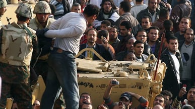 articles/2011/02/02/egypt-revolt-the-violent-scene-in-tahrir-square/dehghanpisheh-egypt-update_157520_fhlys4