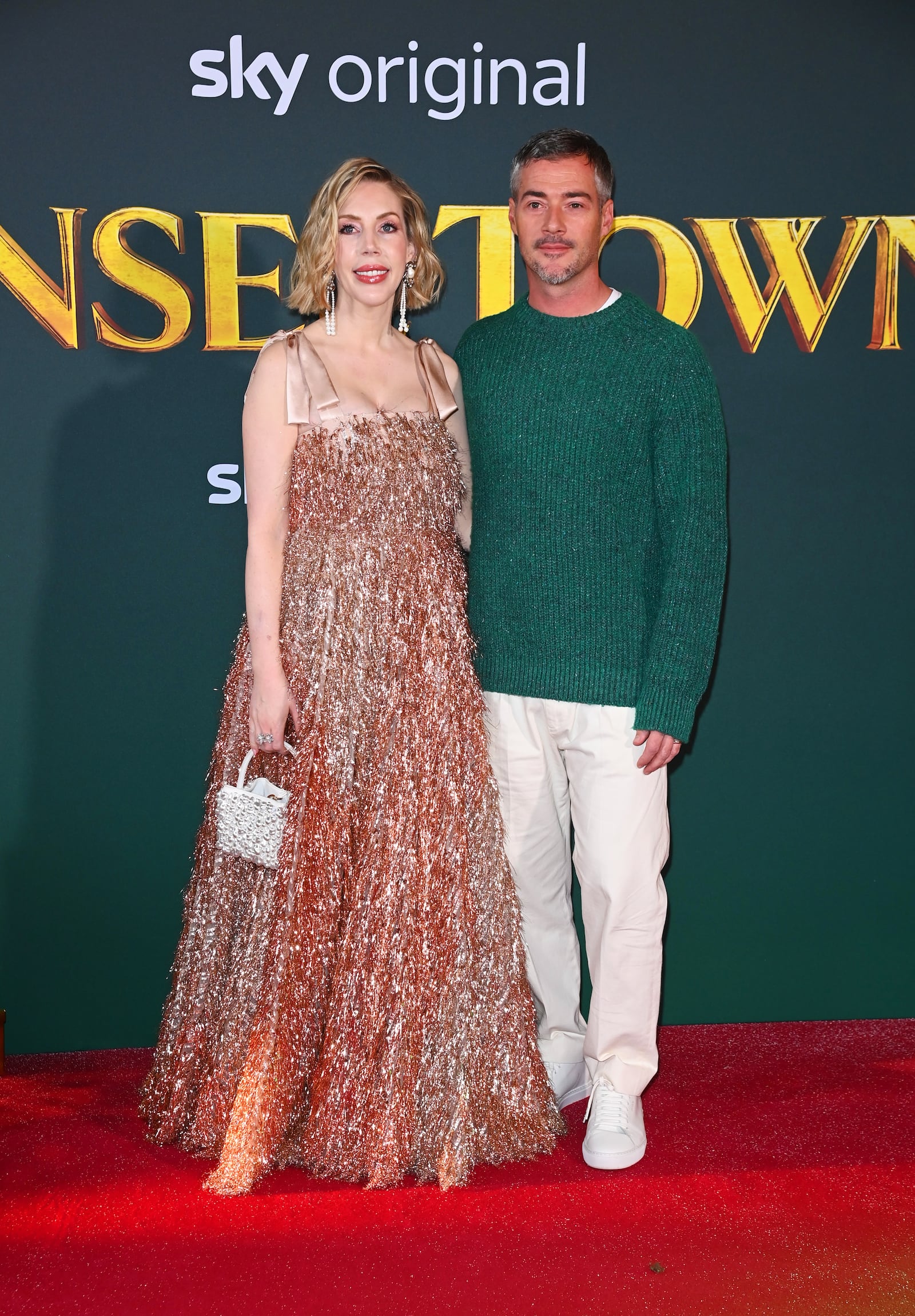 LONDON, ENGLAND - NOVEMBER 27: Katherine Ryan and Bobby Kootstra attend the World Premiere of "Tinsel Town" at Vue Leicester Square on November 27, 2025 in London, England.