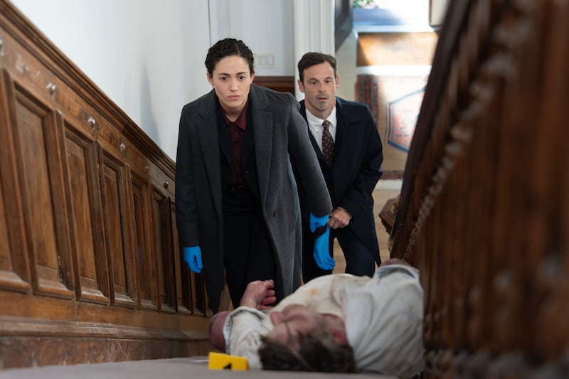 Emmy Rossum and Scoot McNairy.