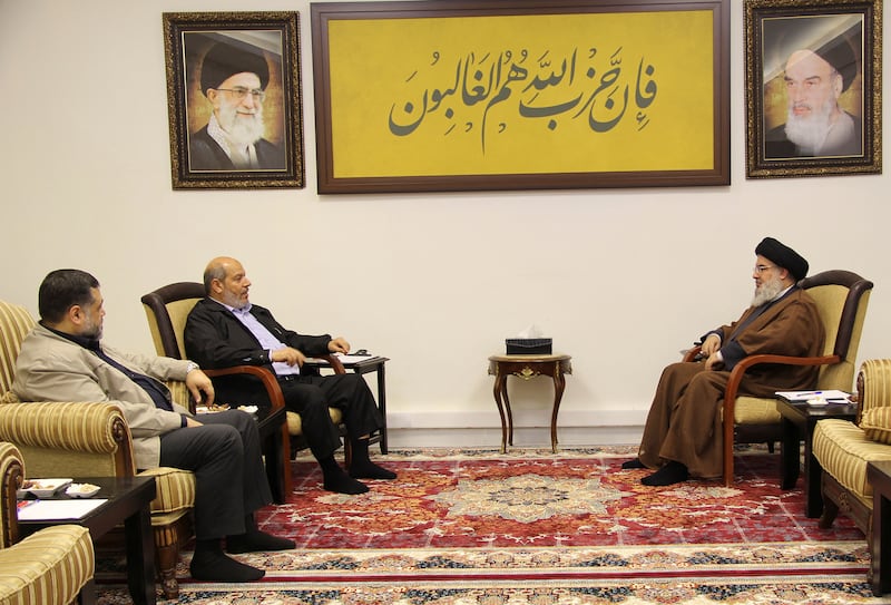 Lebanon's Hezbollah leader Sayyed Hassan Nasrallah meets with Hamas officials, Khalil al-Hayya and Osama Hamdan.