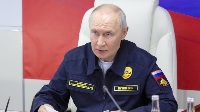Russian President Vladimir Putin chairs a meeting on board of a missile cruiser “Varyag” in Russia's far eastern Sakhalin Region, Russia, August 12, 2026.