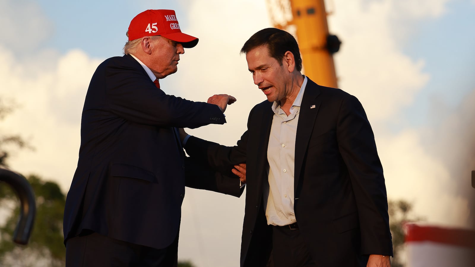 Donald Trump stands with Sen. Marco Rubio (R-FL) during a rally at the Miami-Dade County Fair and Exposition