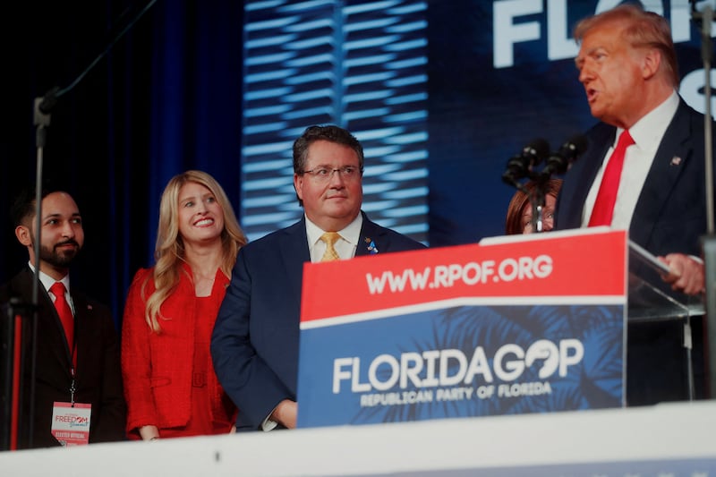 Florida State House Rep. Randy Fine looks on while former U.S. President and Presidential Republican candidate Donald Trump speaks to his supporters during the Florida Freedom Summit held at the Gaylord Palms Resort & Convention Center in Kissimmee, Florida, U.S., November 4, 2023.  REUTERS/Octavio Jones