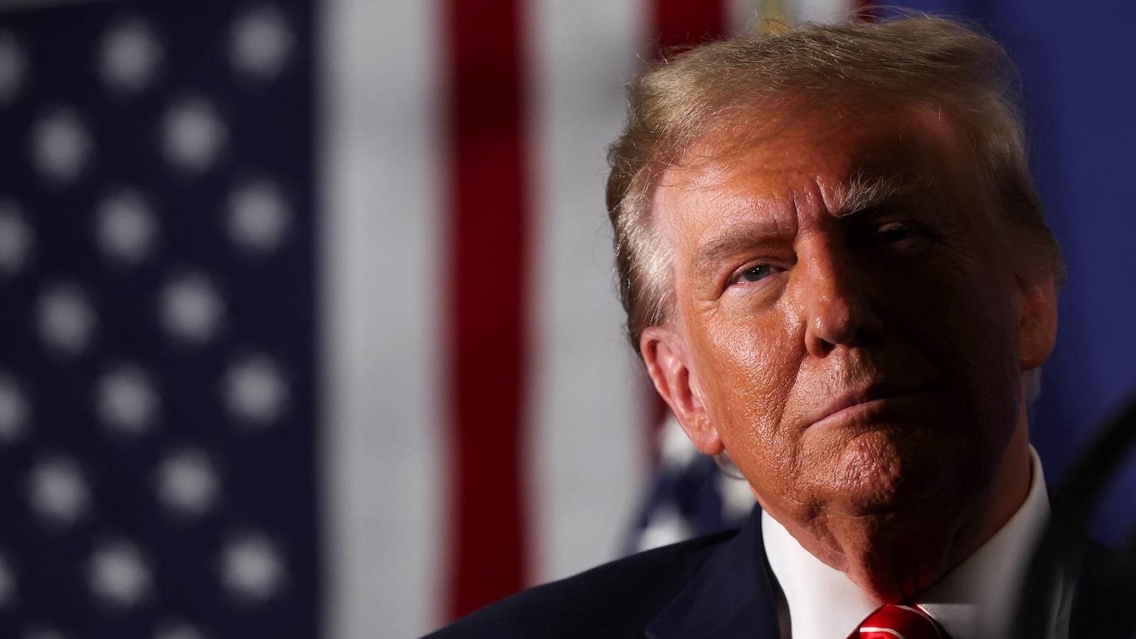 Donald Trump stares forward during a campaign rally in New Hampshire.
