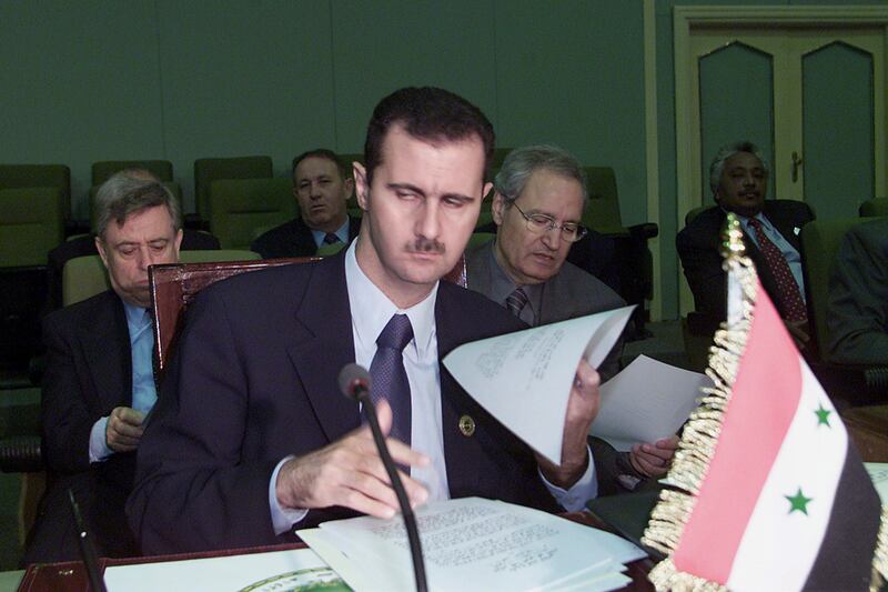 galleries/2013/03/05/father-son-dictatorships-in-north-korea-syria-togo-more-photos/130304-family-dictatorship-assad_uy7s3x