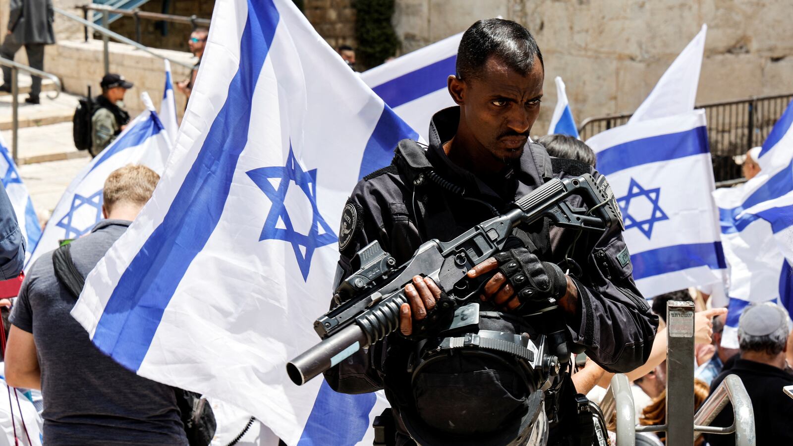 Israeli security personnel stand guard at Damascus gate to Jerusalem’s Old City ahead of the annual flag march that marks Jerusalem Day, May 18, 2023.
