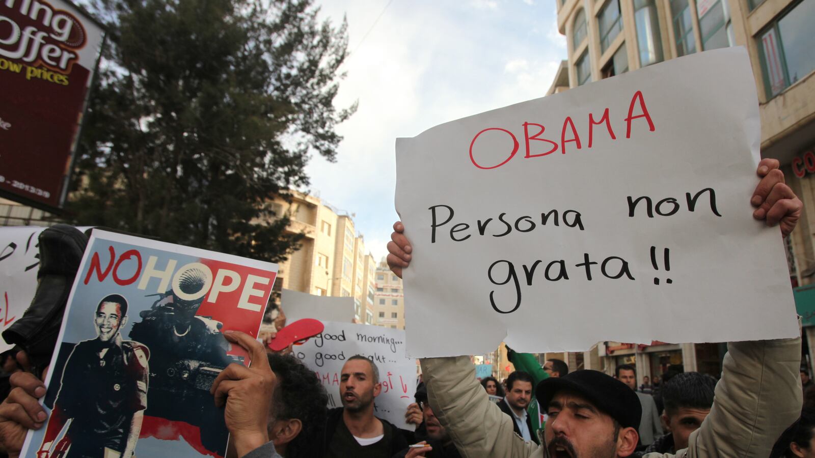 articles/2013/03/19/palestinians-protest-obama-s-visit/obama-protest-ramallah-openz_habskd