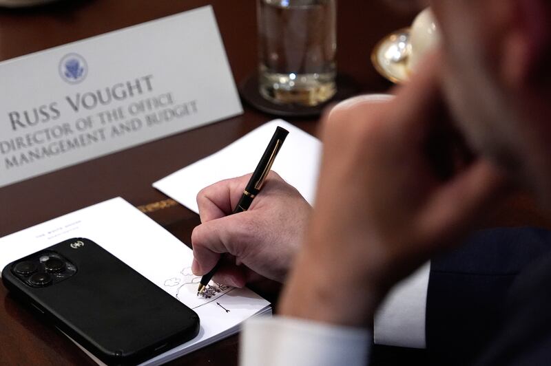 Russ Vought, Director of the Office of Management and Budget, attends the Cabinet meeting at the White House, Tuesday, Dec. 2, 2025, in Washington.